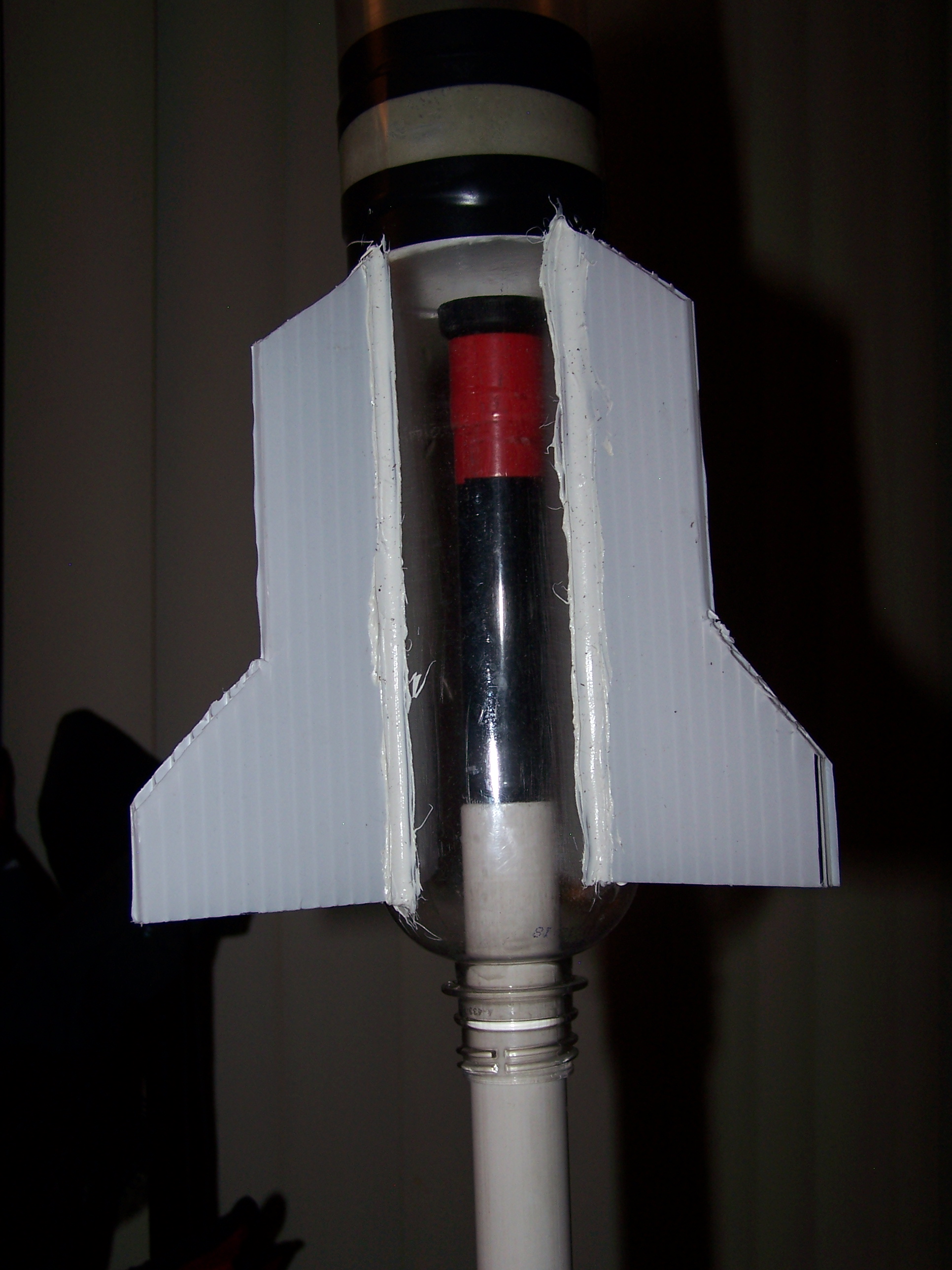 &quot;Thrust Capacitor&quot; atop fill tube of Launch Cube. Rocket not fully seated to allow a window view inside.
